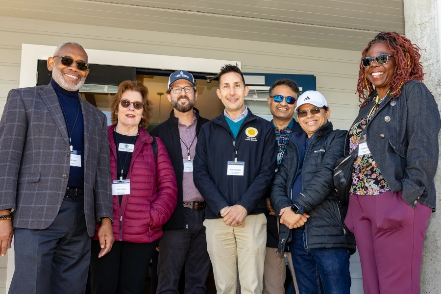 '25 COI Boat Cruise-069A-DG Group ready to board annual boat trip
